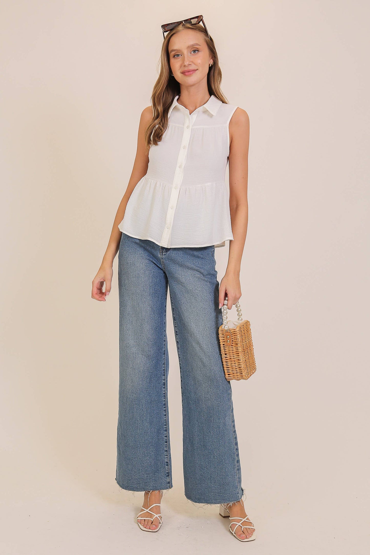 Sleeveless Airflow Peplum Top