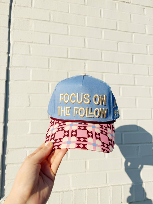 Focus On The Follow Hat